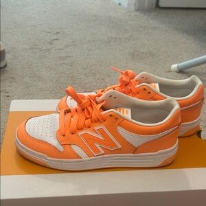 New Balance Kids' Vibrant Orange and White Sneakers